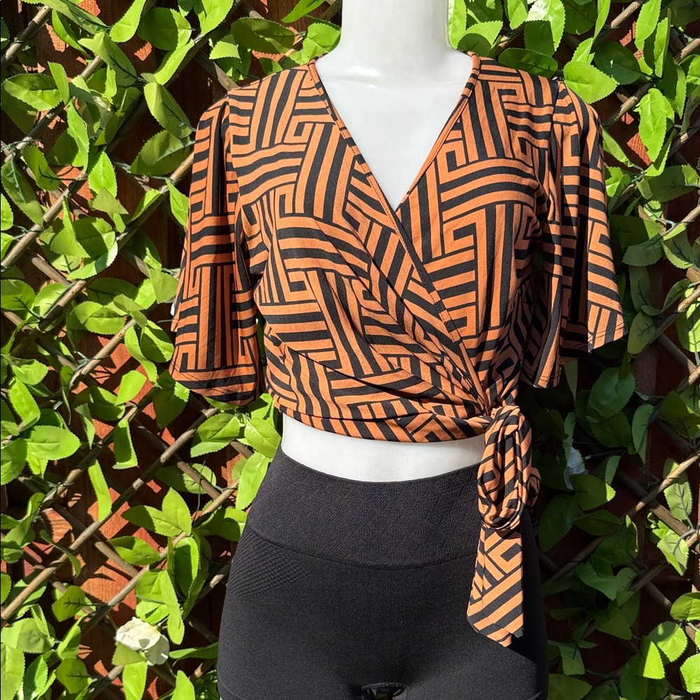 Chic Geometric Wrap Crop Top - Orange and Black